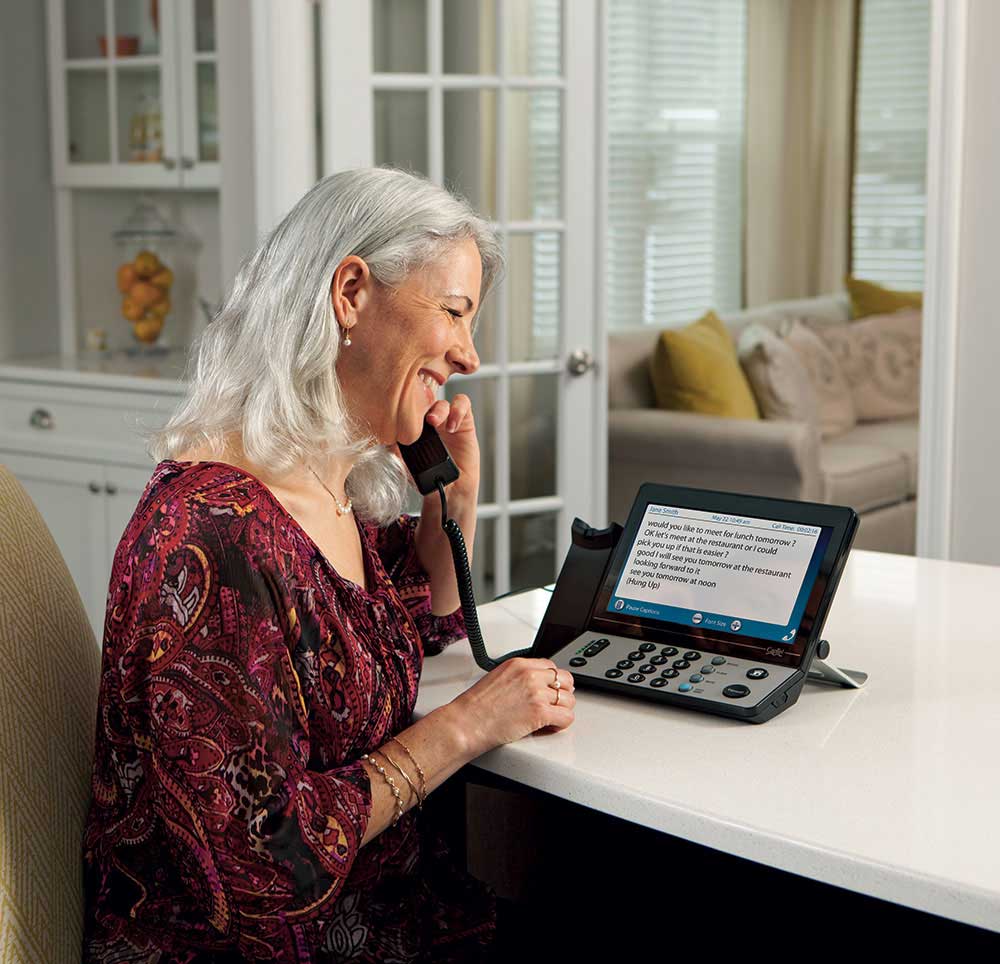 CapTel captioned telephones display every word while the caller is talking to help people with hearing loss understand.