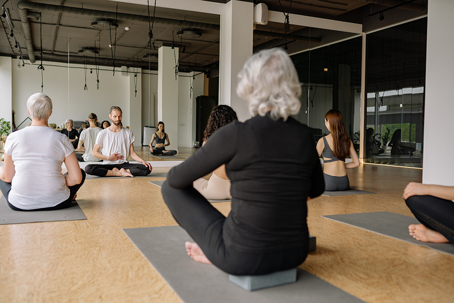 A person is engaging in physical activity to improve their hearing health through exercise.