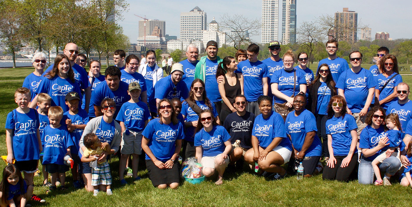 A group of people participating in the HLAA Walk4Hearing event